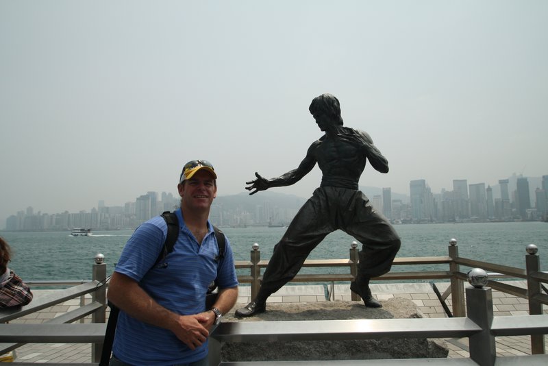 Stu next to Bruce Lee statue