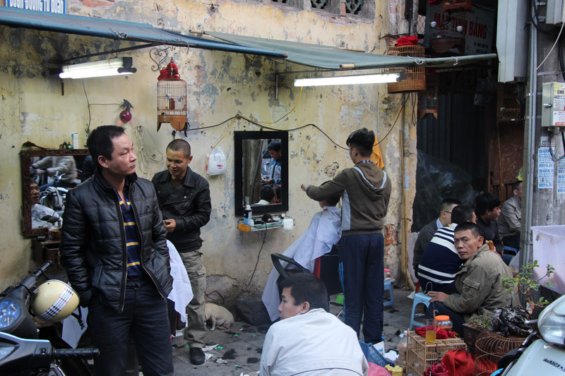 Barber shop on the street, Hanoi style..