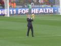 33- Cannavaro brings the trophy out on the field