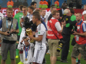 Podolski with the cup