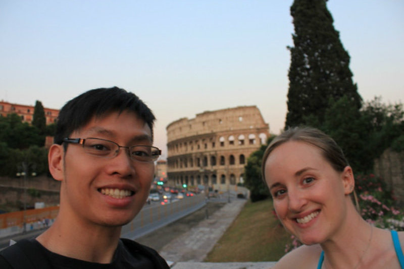 Trying not to block out the colosseum with our big heads