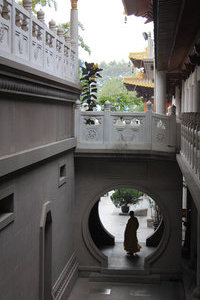 Monk passing through the tunnel