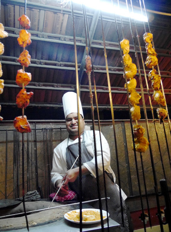 The barbecue man - Umaid Bahran Jaipur. He makes wonderful naam breads