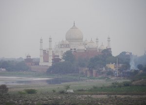 Agra Red Fort view of Taj Mahal and the smoke of the funeral pyres