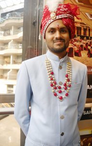 Bridegroom's brother came up in the lift with us and posed for photo as he was so beautifully dressed in his traditional outfit