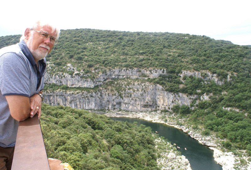 Bob watches the canoes in the gorge of the Ardeche