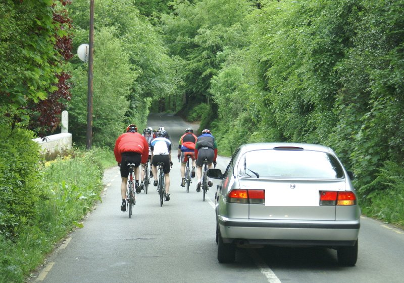 Cyclists, stupidly careless of anyone else on the public highway, racing in the Wexford 200