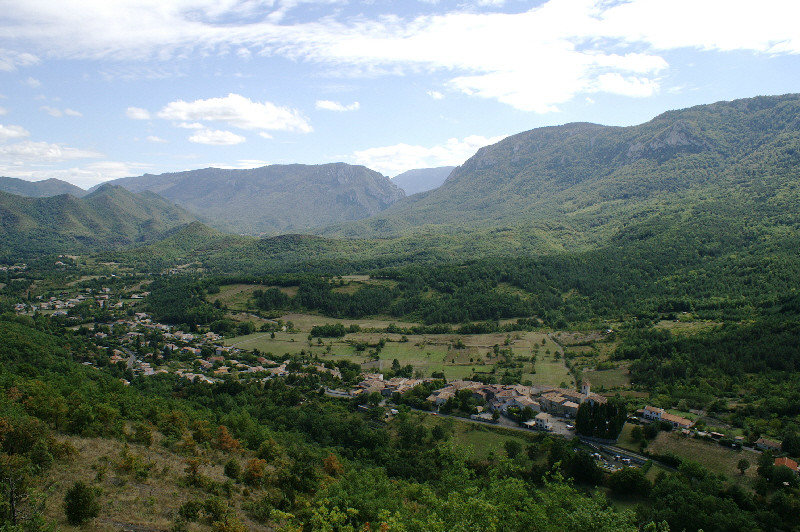 A town nestling in a valley in the mountains