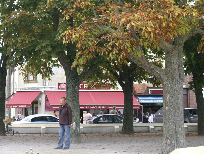 The famed game of Boules under almost autumnal trees in Le Crotoy