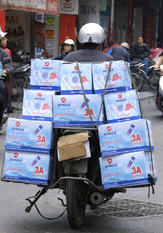 Wide scooter load, normal for Vietnam