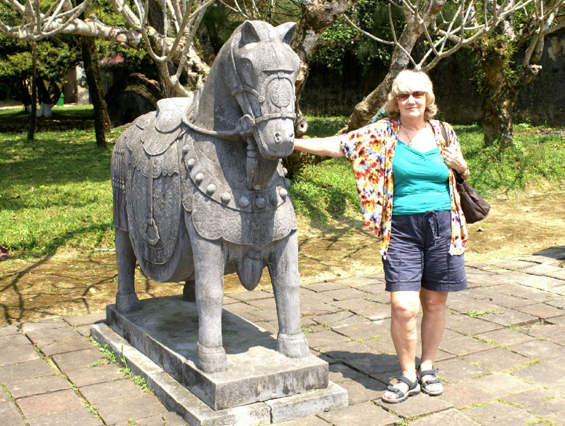 Posing by the Horse at Royal tomb of Minh Mang