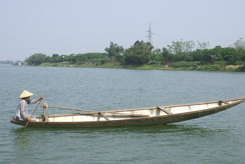 Working boat on Hue Perfume River 