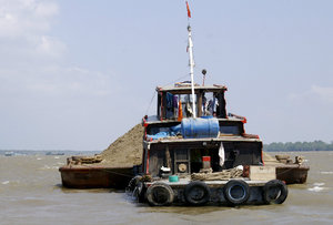 They dredge the sand from the Mekong and send it to Saigon and Singpore