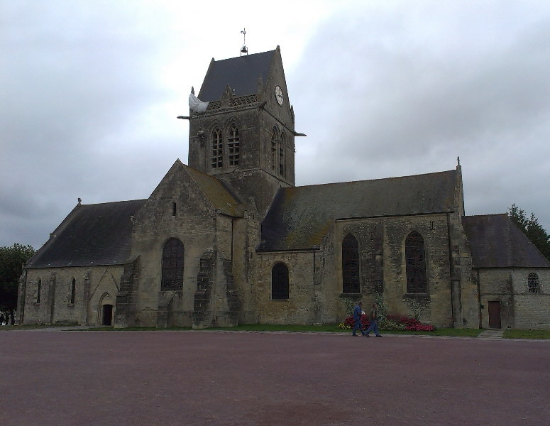 Sainte Marie Eglise with the suspended parachutist hanging from the roof