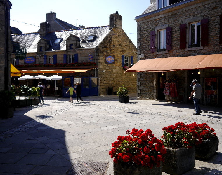 Concarneau - is touristy but charming and full of lovely buidings and flowers