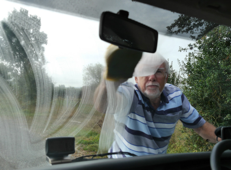 Bob has to clean the windscreen of dead flies so I can take photos