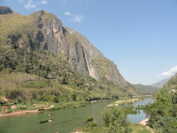 The imposing cliff of Nong Khiaw