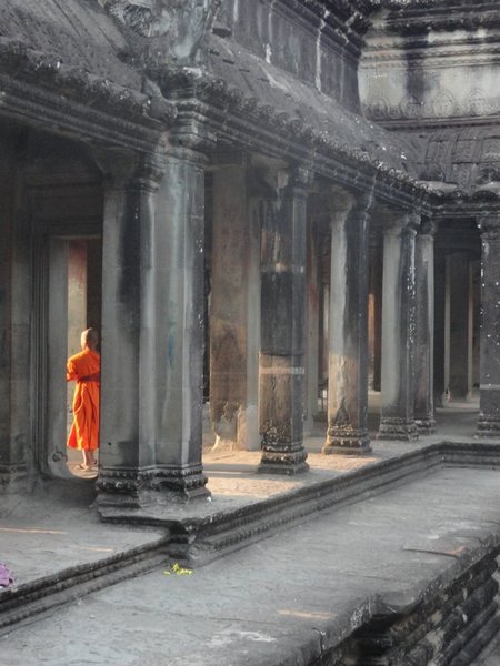 Monk inside Angkor Wat