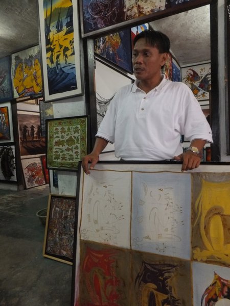 Very persistent Batik painting salesman!
