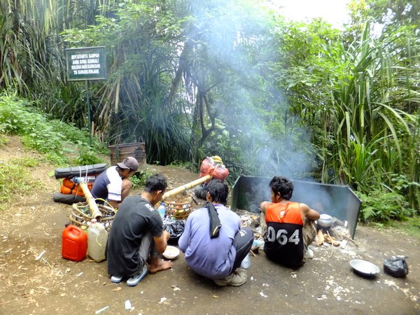 Guides cooking lunch...