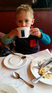 Roman enjoying a hot chocolate in Paris