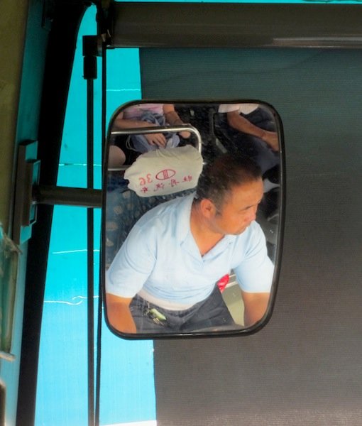 Nose-Picking, Movie-Watching Bus Driver
