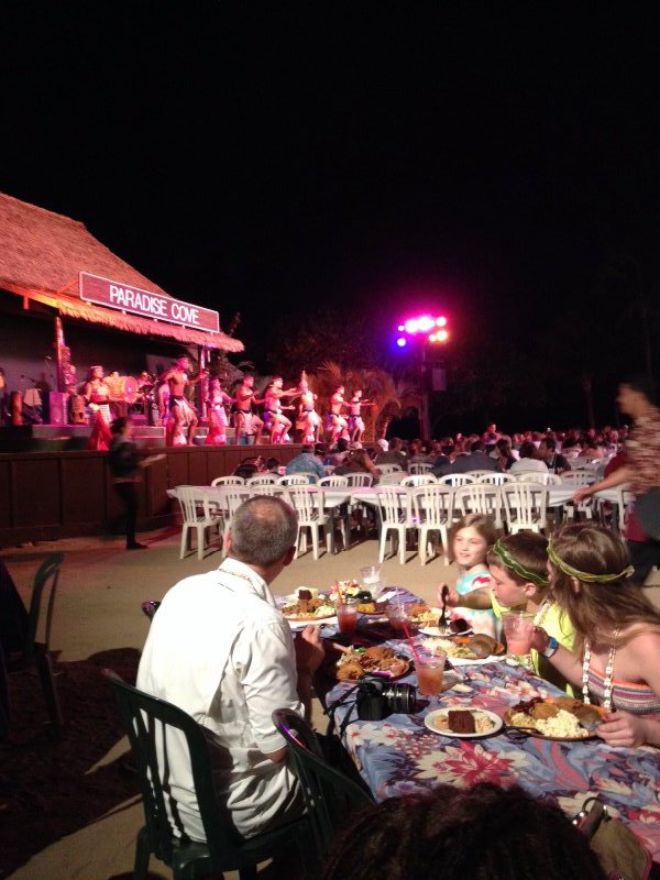 Enjoying our dinner while watching the authentic Hawaiian luau show