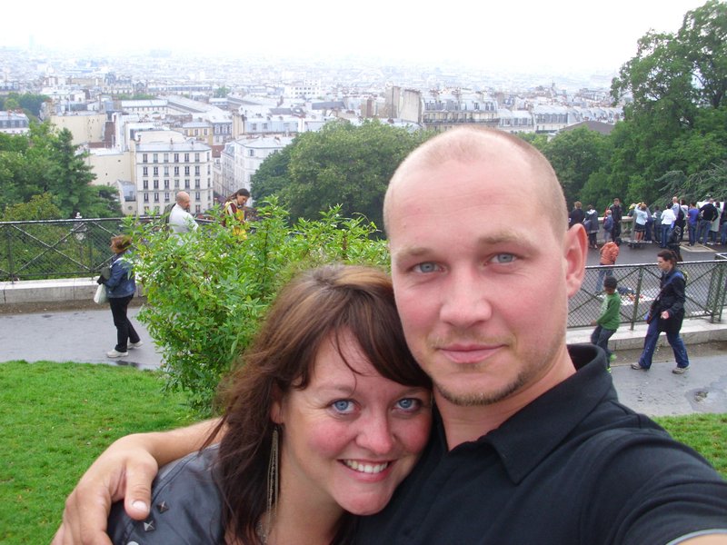 Outside Sacre Couer with views across Paris behind us