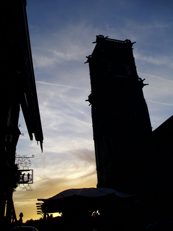 Clamecy church tower silhoutted in the sunset