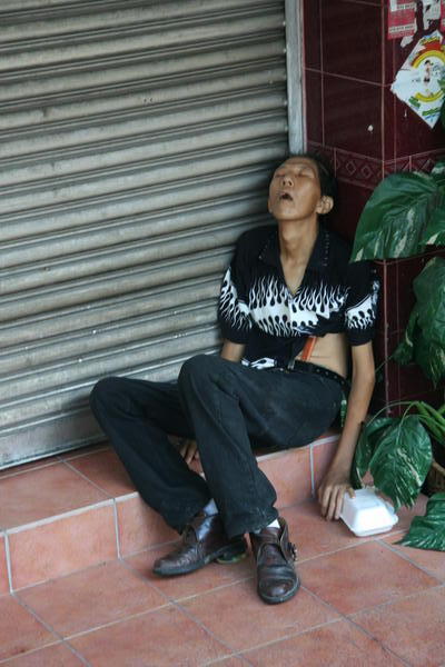 Man asleep in Kuala Lumpar