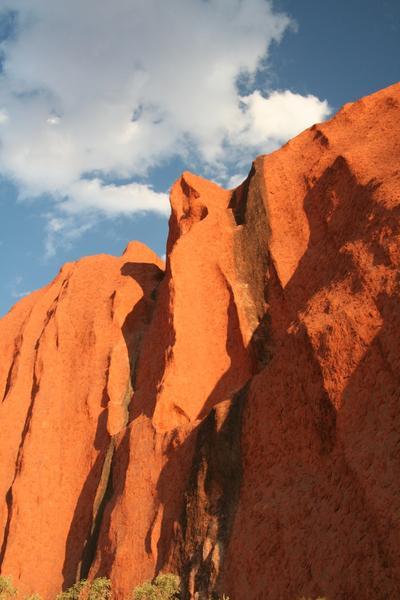 Close up of the towering red rock