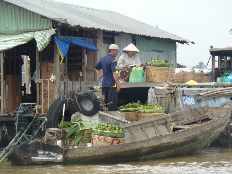 A floating market, on the river