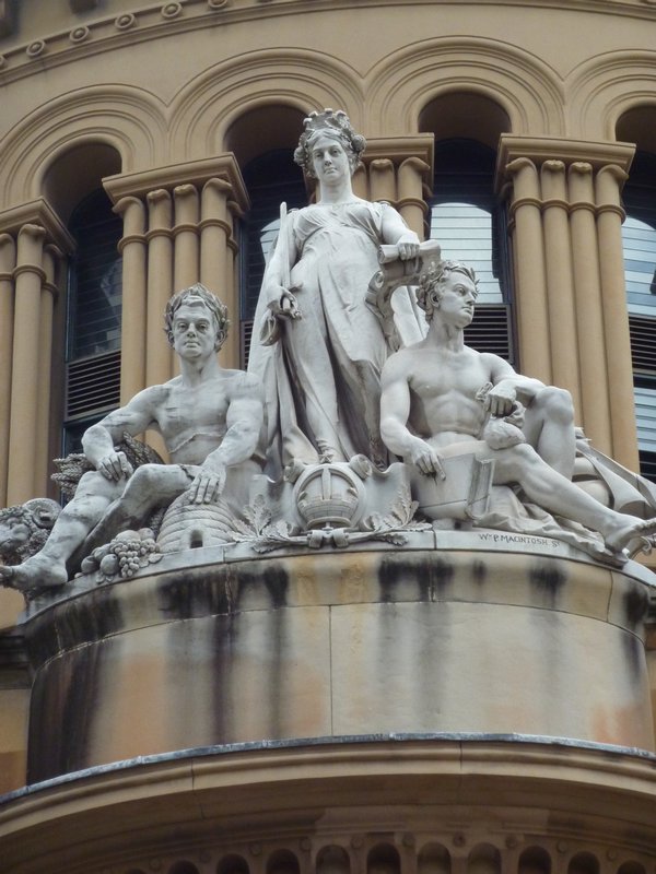 Statues on top of Queen Victoria building