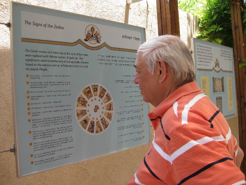 Sandy checking out the zodiac explanation outside Beit Alpha Synagogue