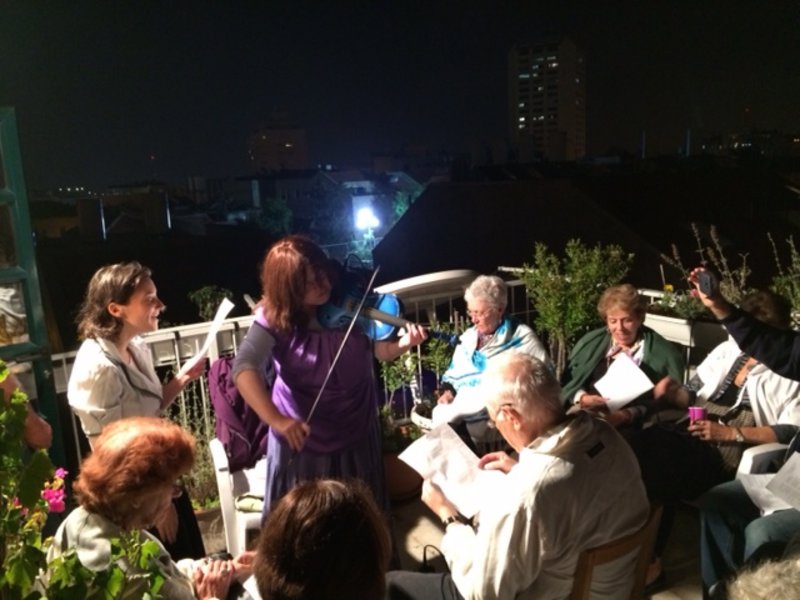 Music on the roof with Rachel singing and Gila on violin