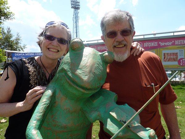 Carol and Bill with a fiddle-playing frog