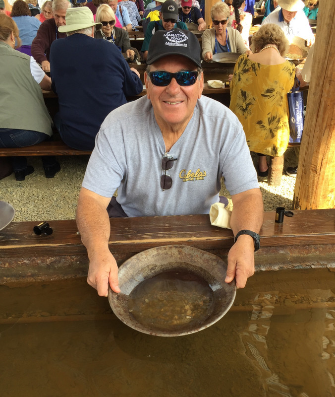 Don panning for gold.