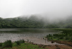 A lake in a volcano on an island on a lake