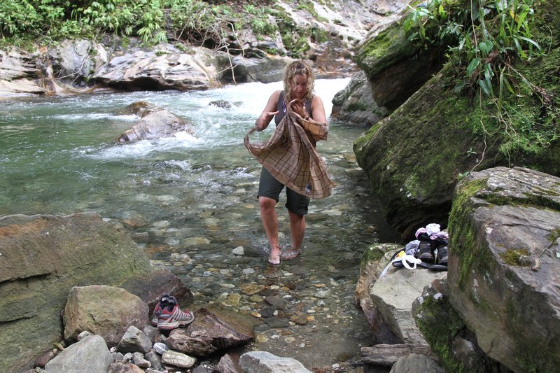 Washing some clothes in the river..