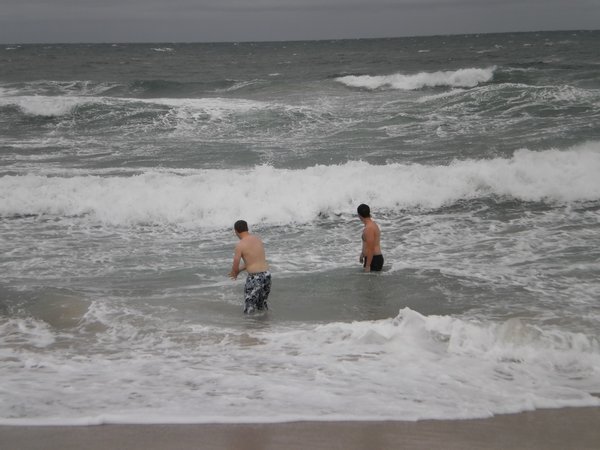 Braving the bad weather just to get a dip in the sea!
