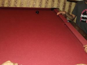 ball rolls up the pool table