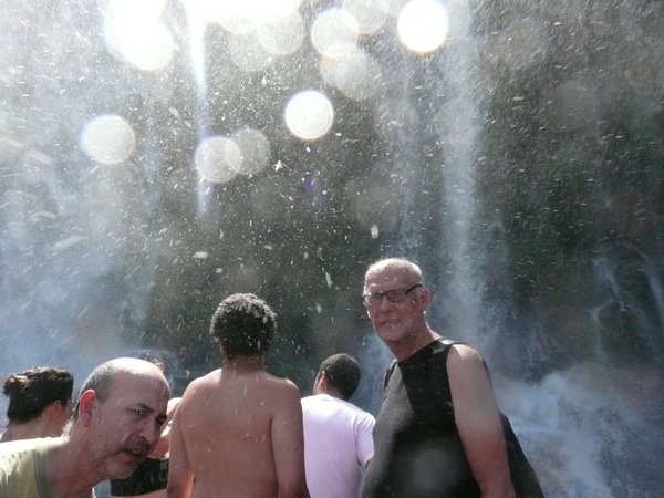 Under the waterfall