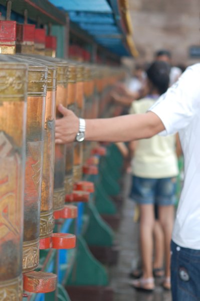 join the queue for the prayer wheels