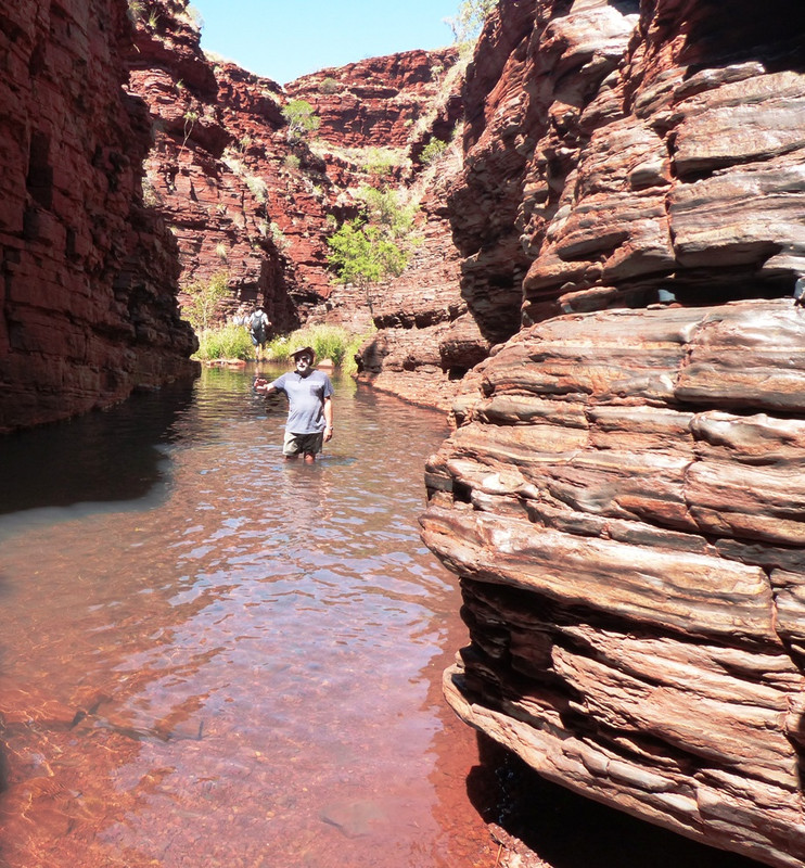 Karajini - Pete wading through a gorge