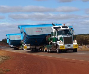 Wide load on road - Huge Tipper parts for dump trucks