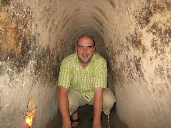 These tunnels had been widened for Tourists BUT The Happy Buddha still found them a tight squeeze!! - Chu Chi Tunnels - Saigon - Vietnam
