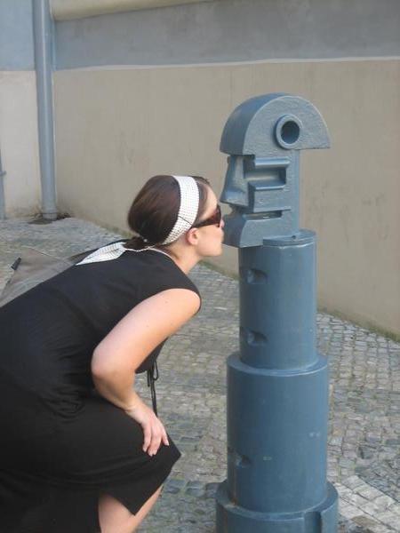 Making out with a parking meter in Prague