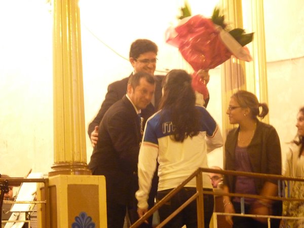 me hanging the band members flowers with 2 other Australians