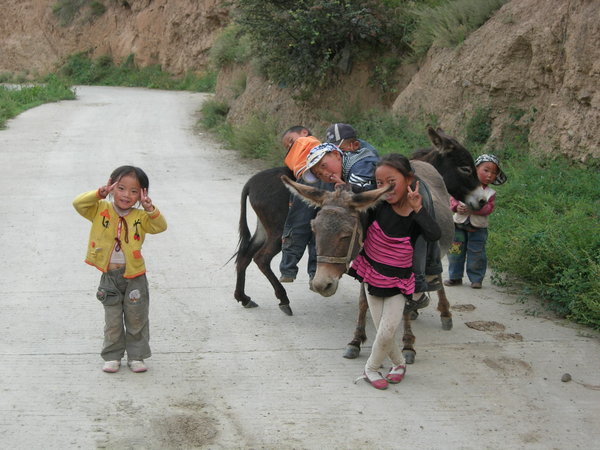 Kids on the road to Garze Gompa