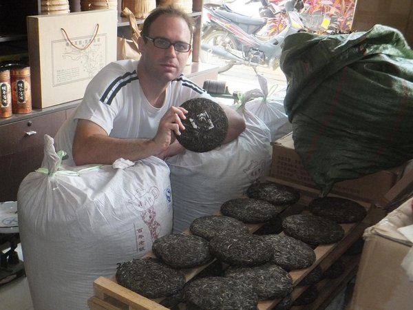 Jacob with newly pressed pu'er cakes